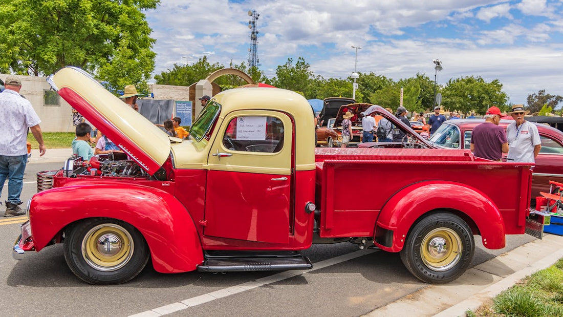 Red pickup truck parked on the street — one of the most stolen vehicles