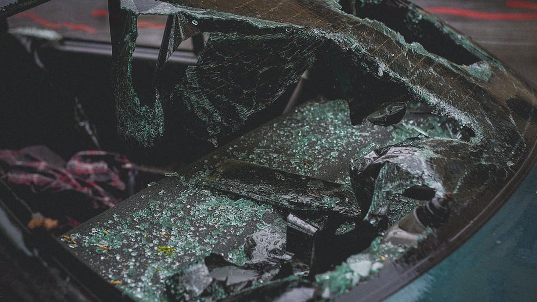 Broken car windshield after a theft — what to do if your car is stolen