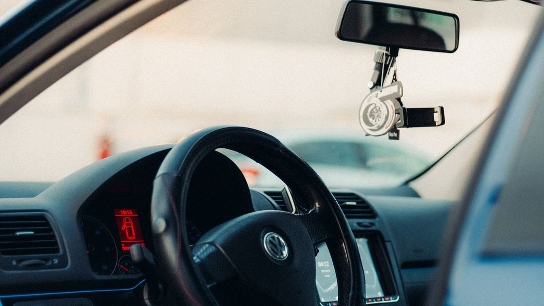 Close-up of a car interior and steering wheel — brake pedal lock to stop car theft